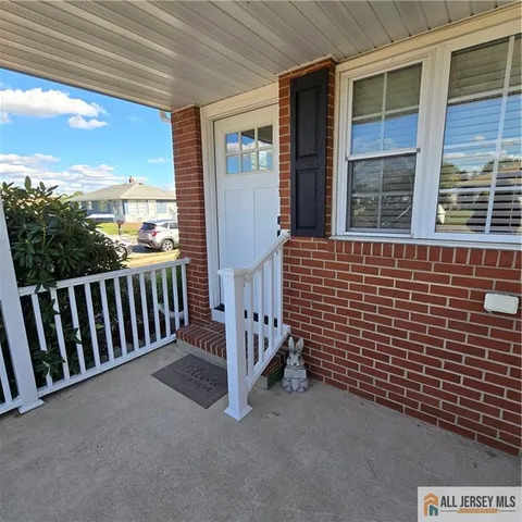 a view of a balcony with stairs