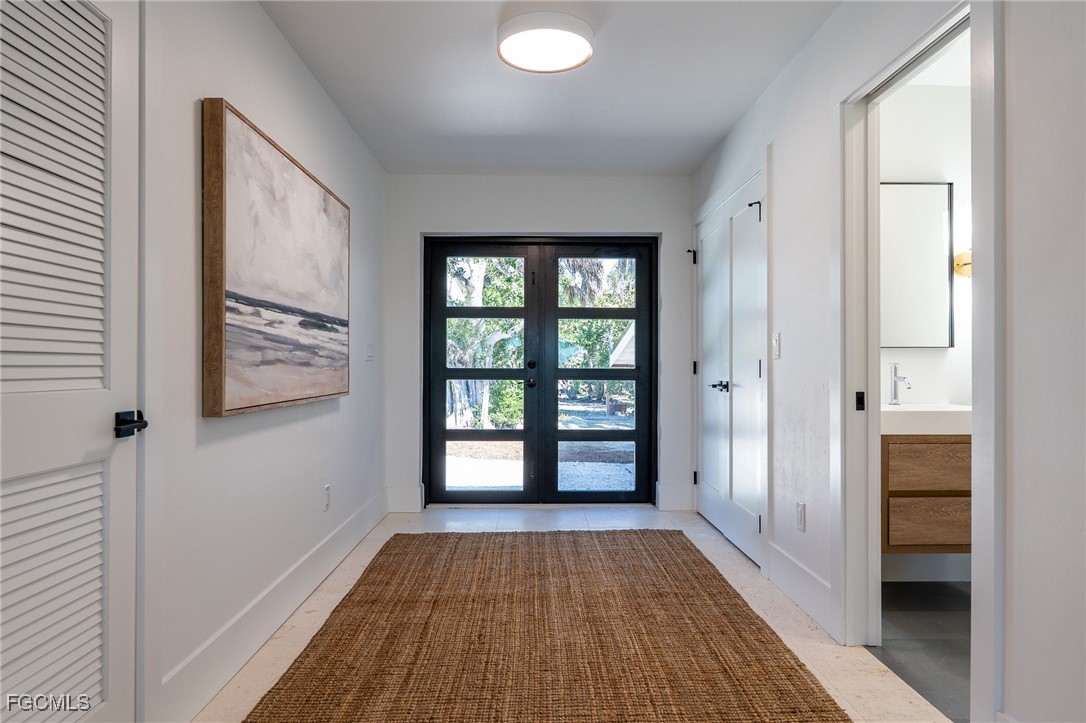 5801 Sanibel Captiva Road Sanibel, FL 33957 - Photo 13 of 45 an empty room with windows and closet
