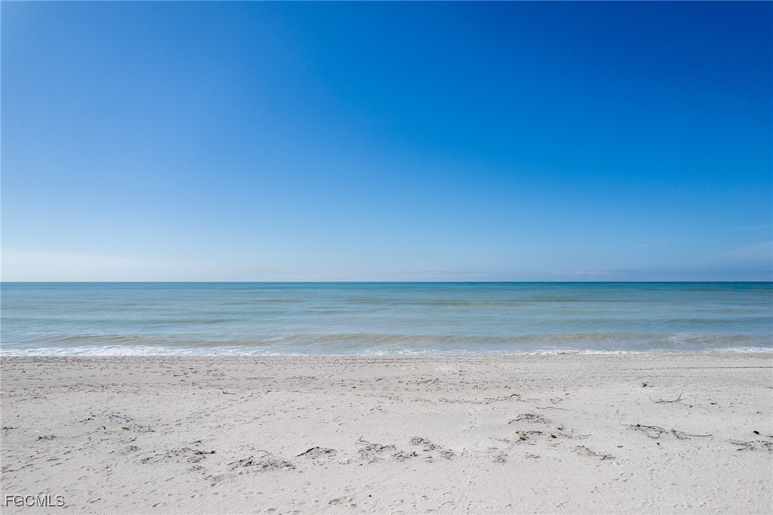 5801 Sanibel Captiva Road Sanibel, FL 33957 - Photo 8 of 45 a view of a beach and an ocean beach