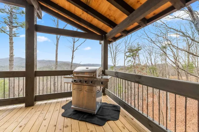 a view of a balcony with chair and glass door