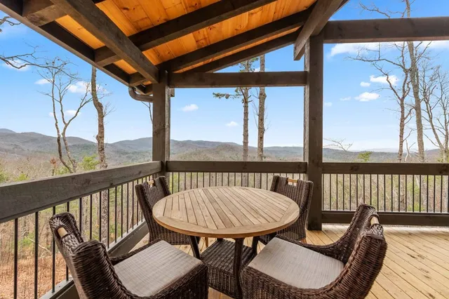 a view of a balcony with chairs