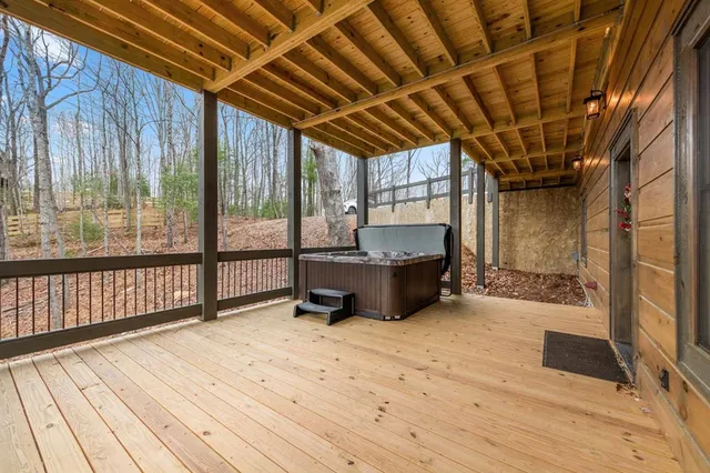 a view of swimming pool with a patio and a yard