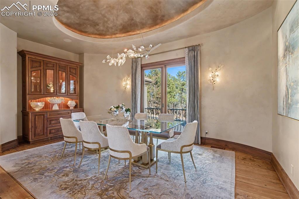 1830 Brantfeather Grove Colorado Springs, CO 80906 - Photo 16 of 50 a view of a dining room with furniture and window