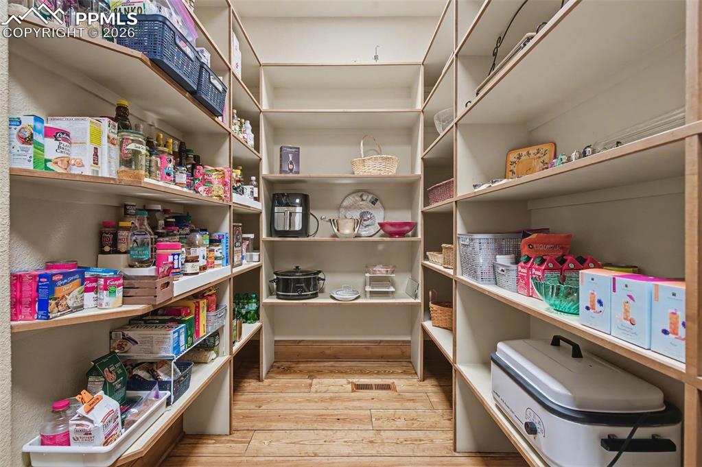 1830 Brantfeather Grove Colorado Springs, CO 80906 - Photo 22 of 50 a room with lots of stuff