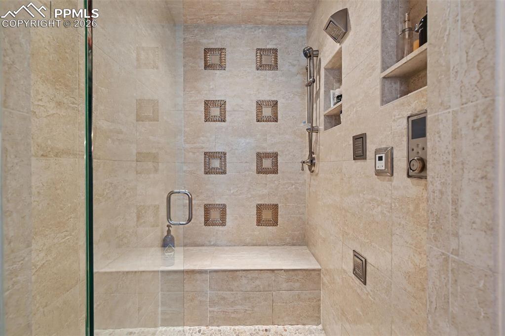 1830 Brantfeather Grove Colorado Springs, CO 80906 - Photo 29 of 50 a bathroom with a shower