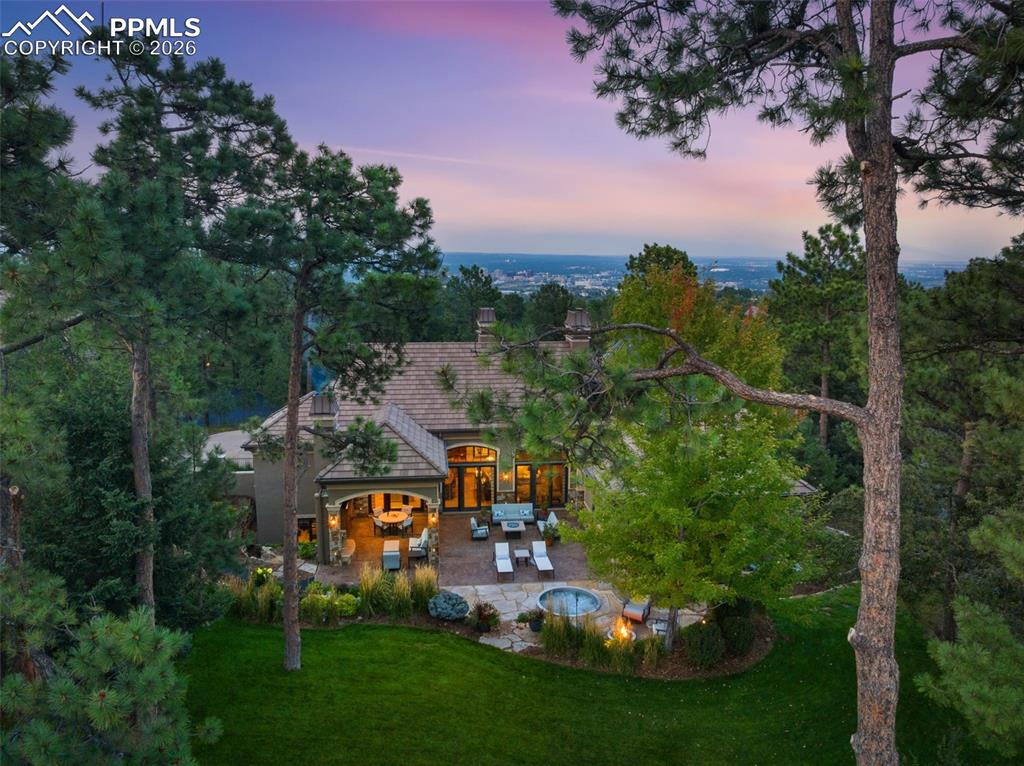 1830 Brantfeather Grove Colorado Springs, CO 80906 - Photo 3 of 50 an aerial view of a house with garden space and street view