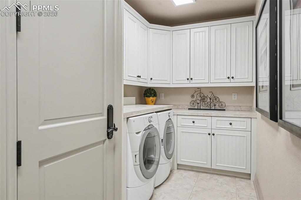 1830 Brantfeather Grove Colorado Springs, CO 80906 - Photo 43 of 50 a utility room with dryer and washer