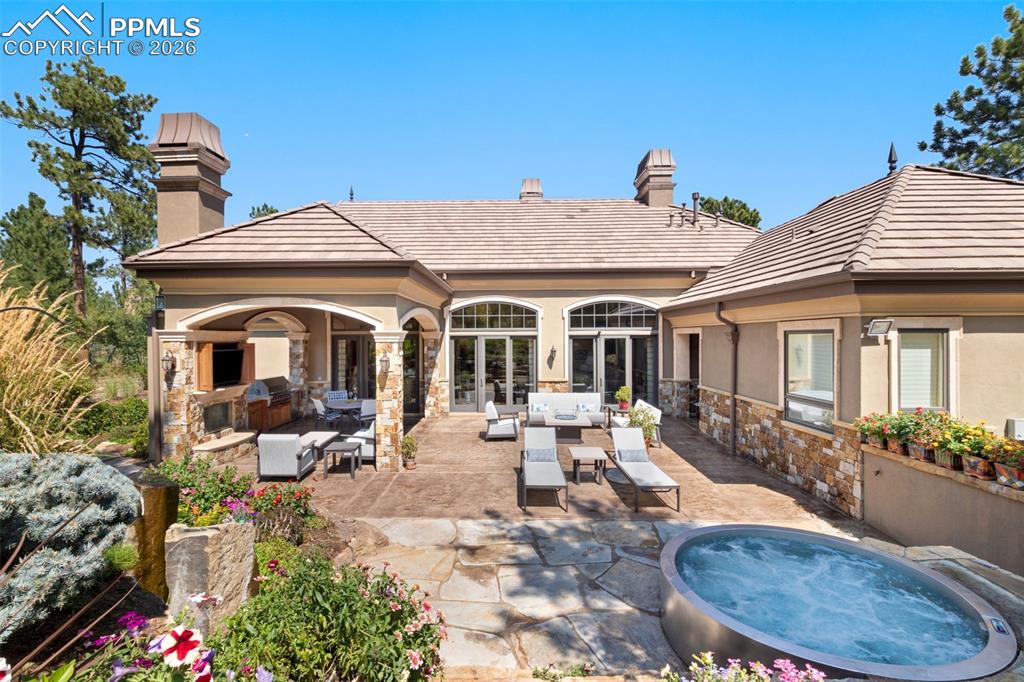 1830 Brantfeather Grove Colorado Springs, CO 80906 - Photo 46 of 50 a view of a house with swimming pool and sitting area