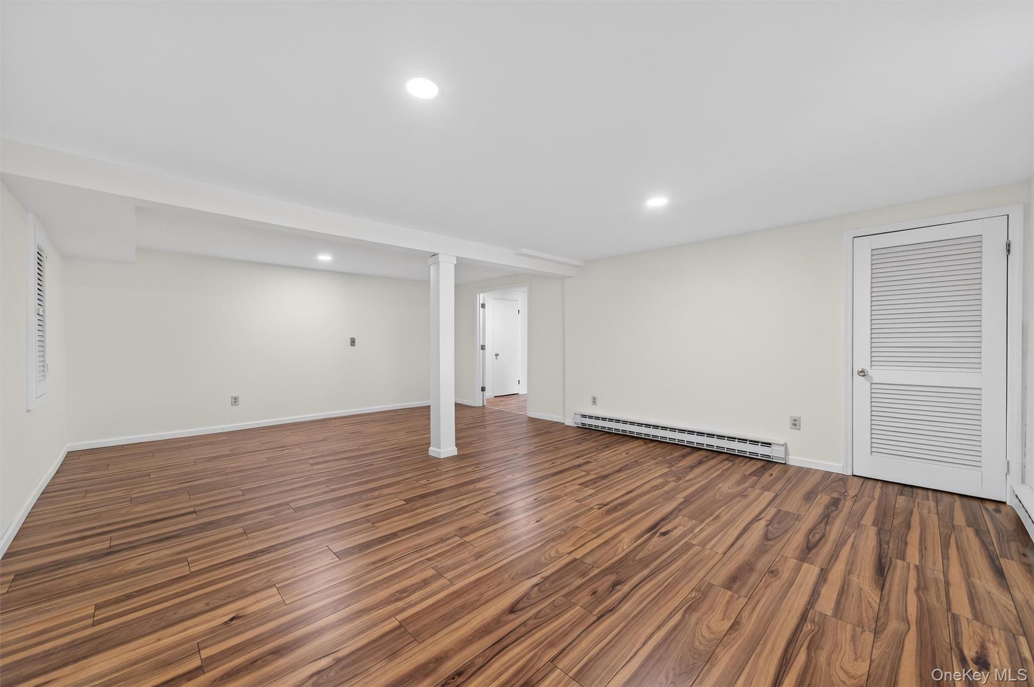 420 South Plank Road Westtown, NY 10998 - Photo 18 of 26 a view of an empty room and wooden floor