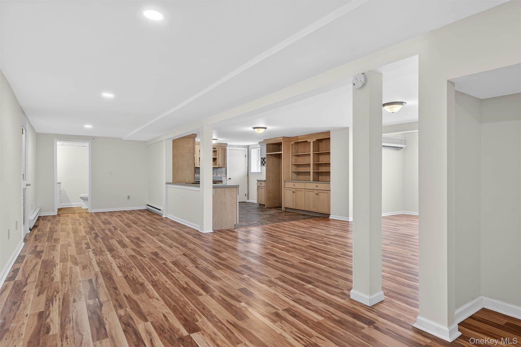 420 South Plank Road Westtown, NY 10998 - Photo 19 of 26 a view of a room with wooden floor and windows