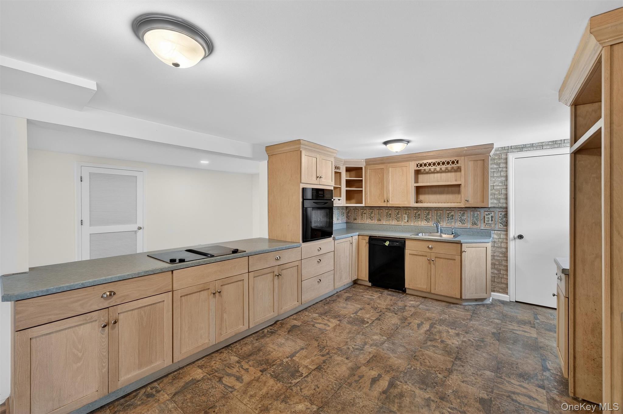 420 South Plank Road Westtown, NY 10998 - Photo 20 of 26 a large white kitchen with a sink and dishwasher a refrigerator with white cabinets
