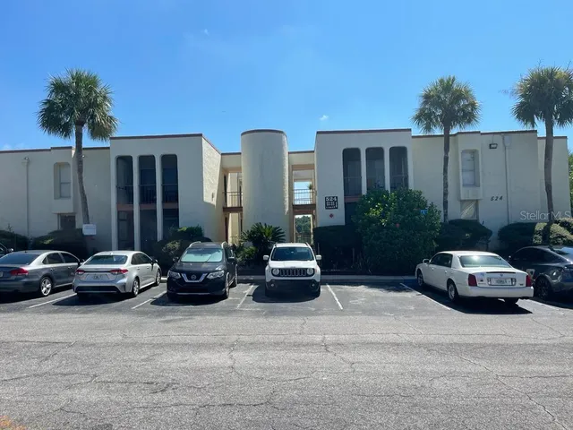 a car parked in front of a house