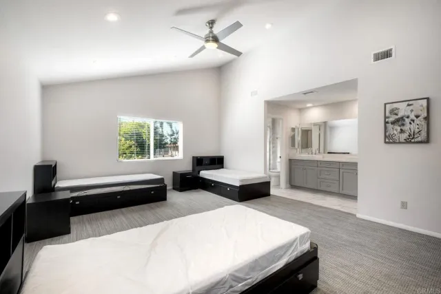 a bathroom with a glass shower door