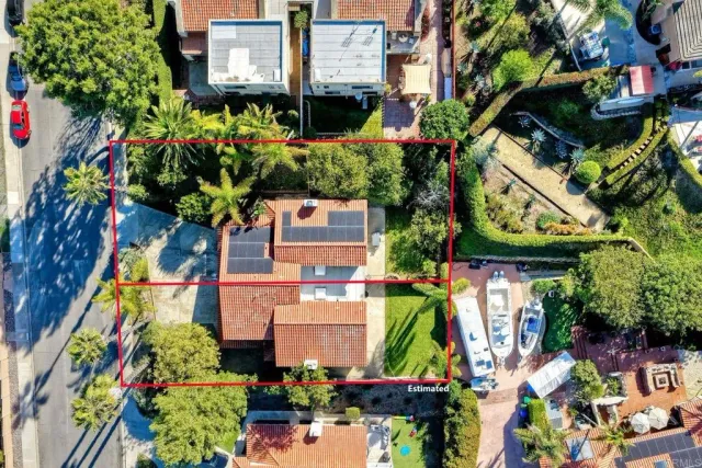 a view of a backyard with a garden