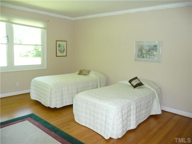 213 Bayleaf Drive Raleigh, NC 27615 - Photo 16 of 25 Hardwood floors in all bedrooms and hallway Bedroom