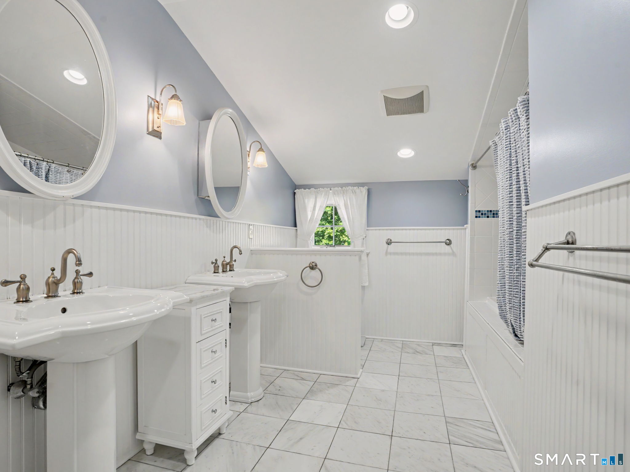 18 Deerfield Road Wilton, CT 06897 - Photo 26 of 40 Sparkling white Full Bathroom, 2 sinks and privacy wall.