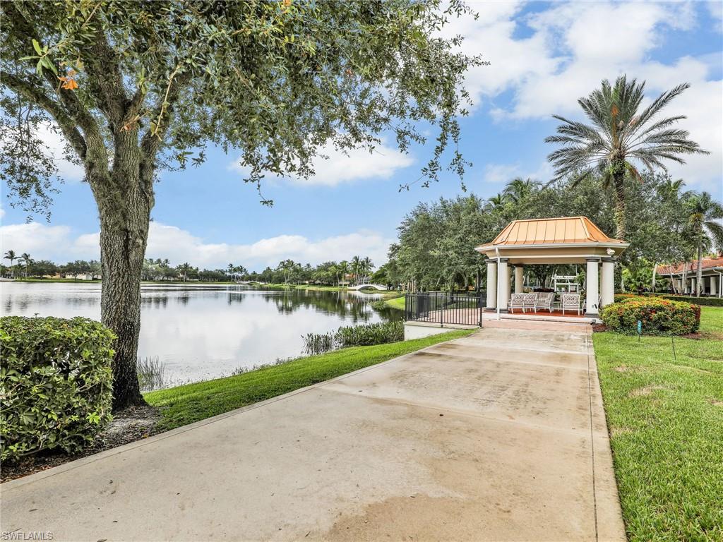 3580 Islandwalk Circle Naples, FL 34119 - Photo 45 of 47 View of property's community featuring a gazebo, a lawn, and a water view
