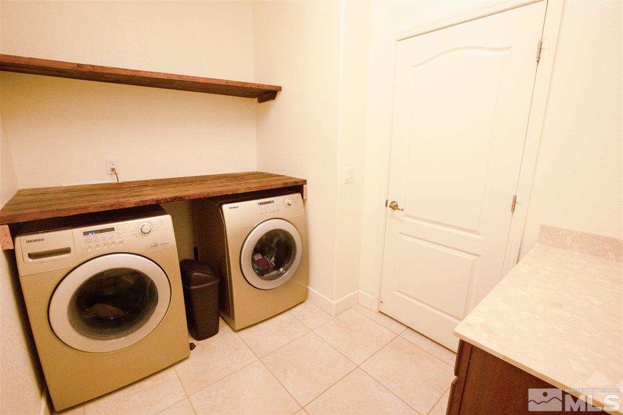1885 Fledge Creek Drive Reno, NV 89521 - Photo 12 of 30 a utility room with dryer and washer