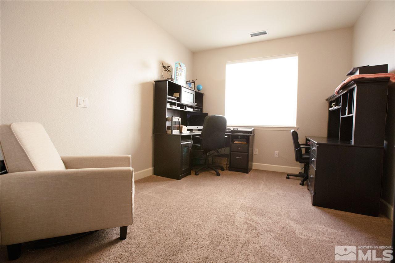 1885 Fledge Creek Drive Reno, NV 89521 - Photo 18 of 30 a living room with furniture hardwood and a window
