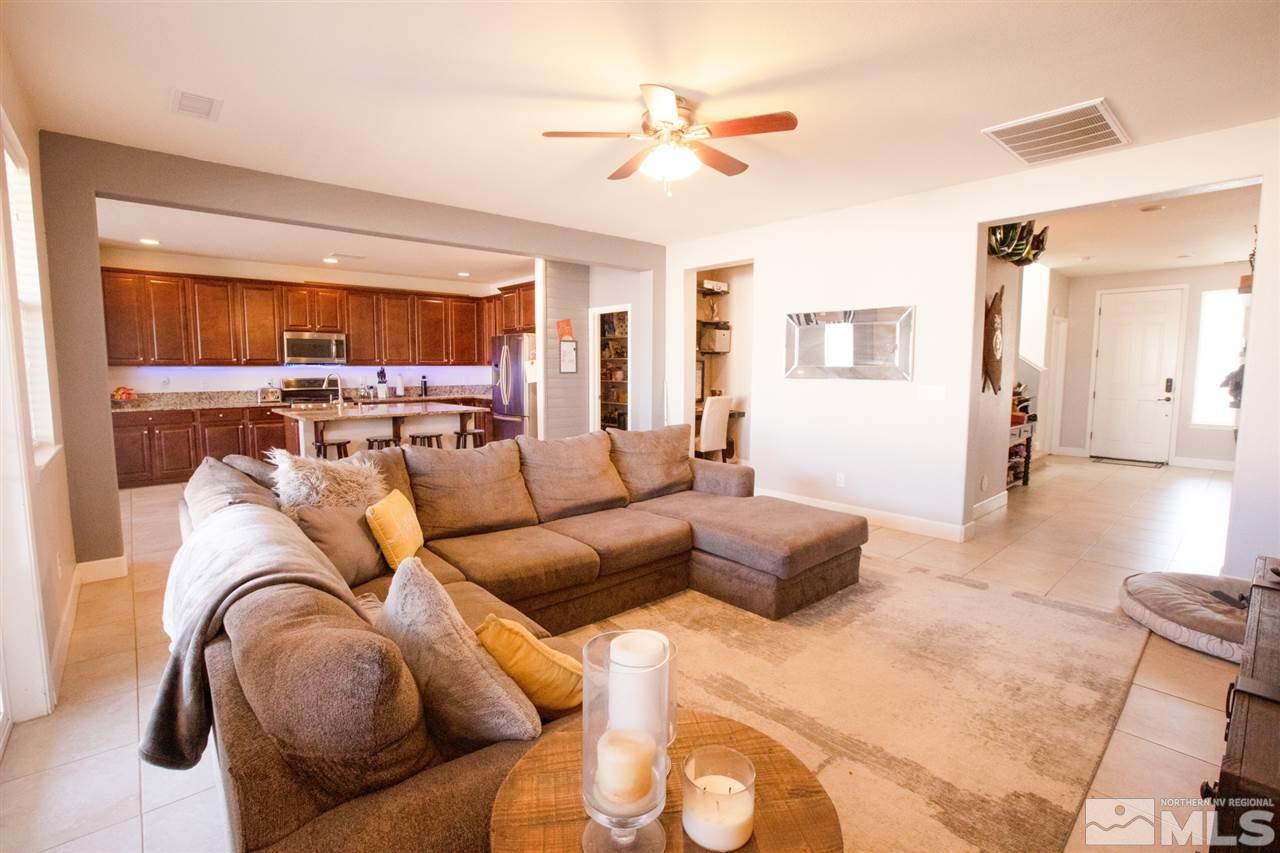 1885 Fledge Creek Drive Reno, NV 89521 - Photo 4 of 30 a living room with furniture and a large window