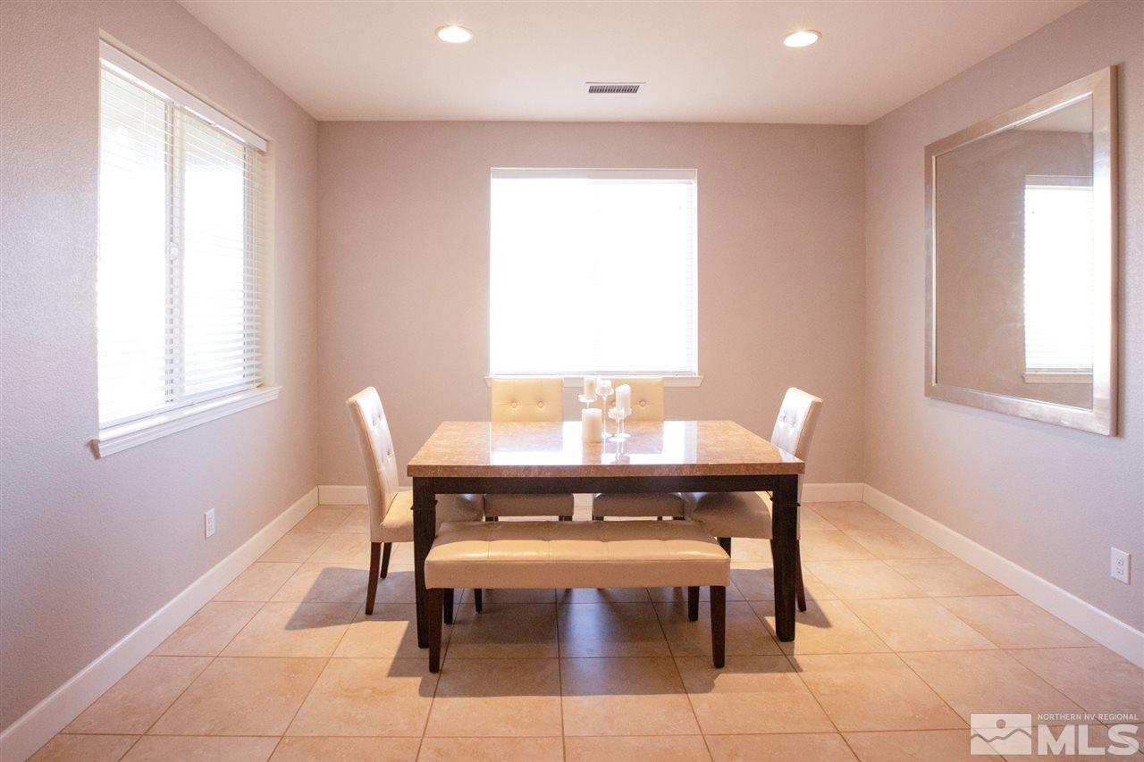 1885 Fledge Creek Drive Reno, NV 89521 - Photo 9 of 30 a view of a dining room with furniture