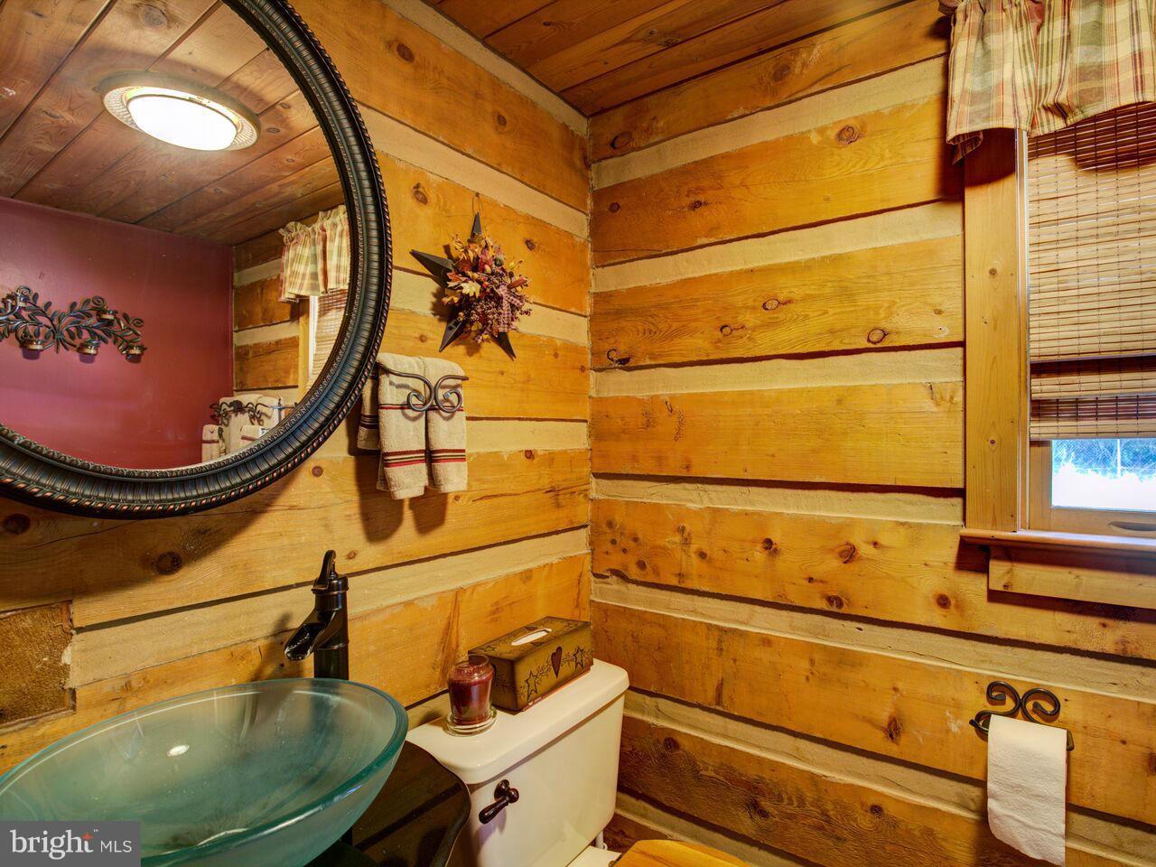 1620 Runnymeade Road Bunker Hill, WV 25413 - Photo 23 of 29 Full bath on main level