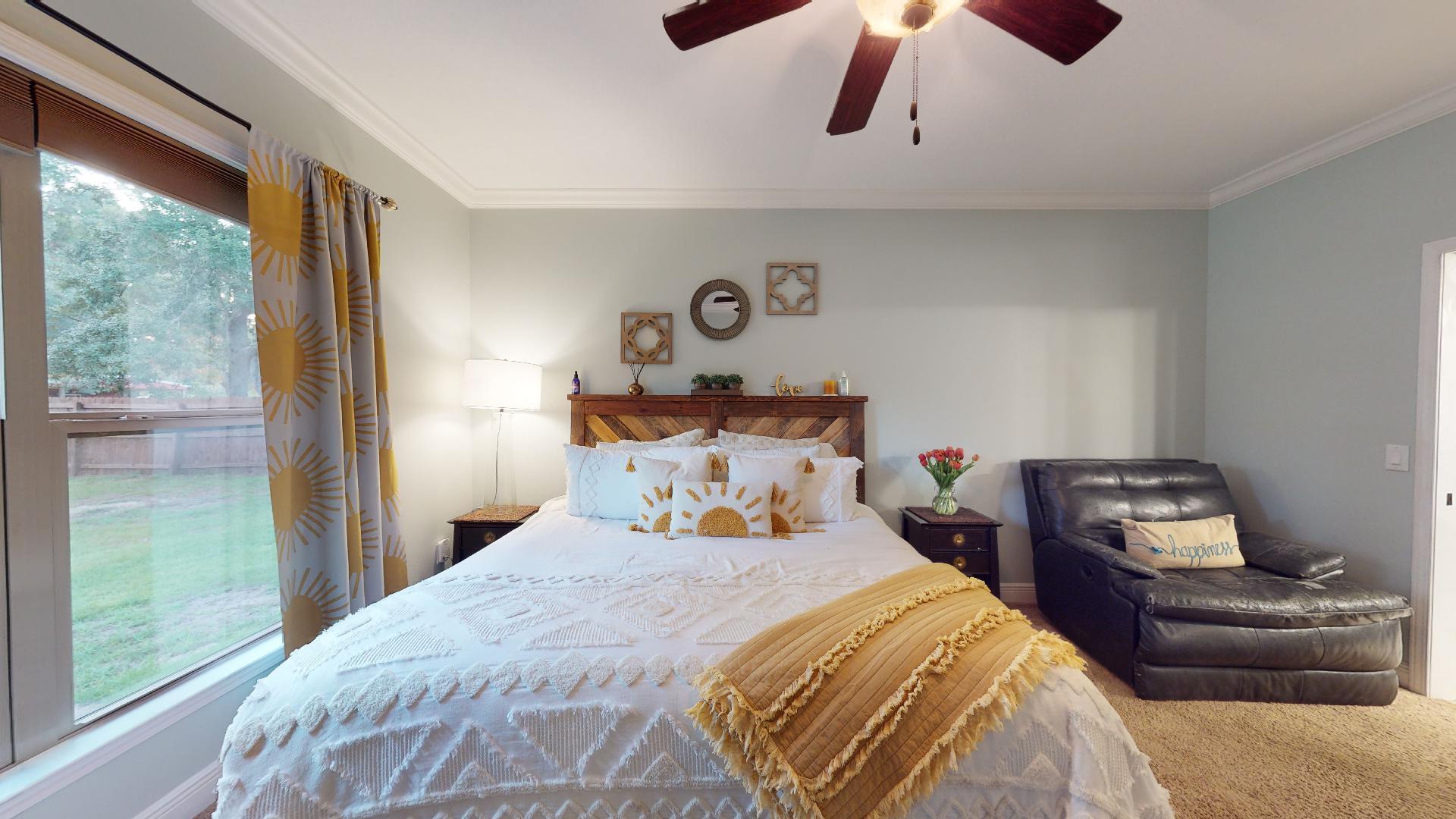 1959 Commodore Drive Navarre, FL 32566 - Photo 25 of 56 a bedroom with a bed and a window