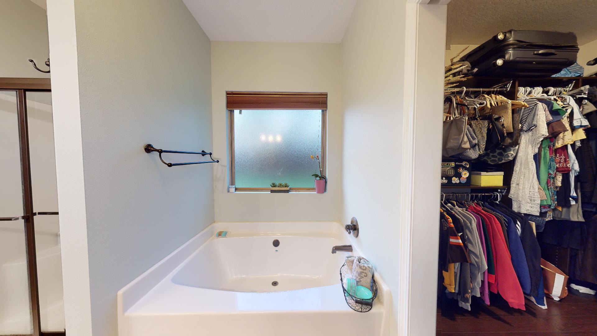 1959 Commodore Drive Navarre, FL 32566 - Photo 28 of 56 a view of walk in closet with clothes and shoes
