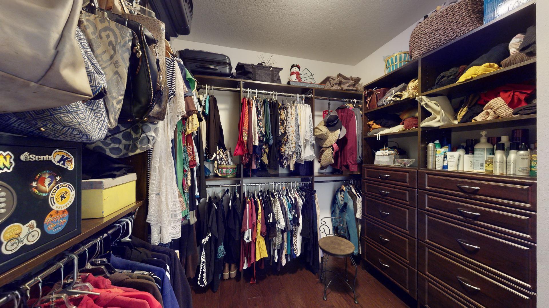 1959 Commodore Drive Navarre, FL 32566 - Photo 29 of 56 a view of walk in closet with clothes