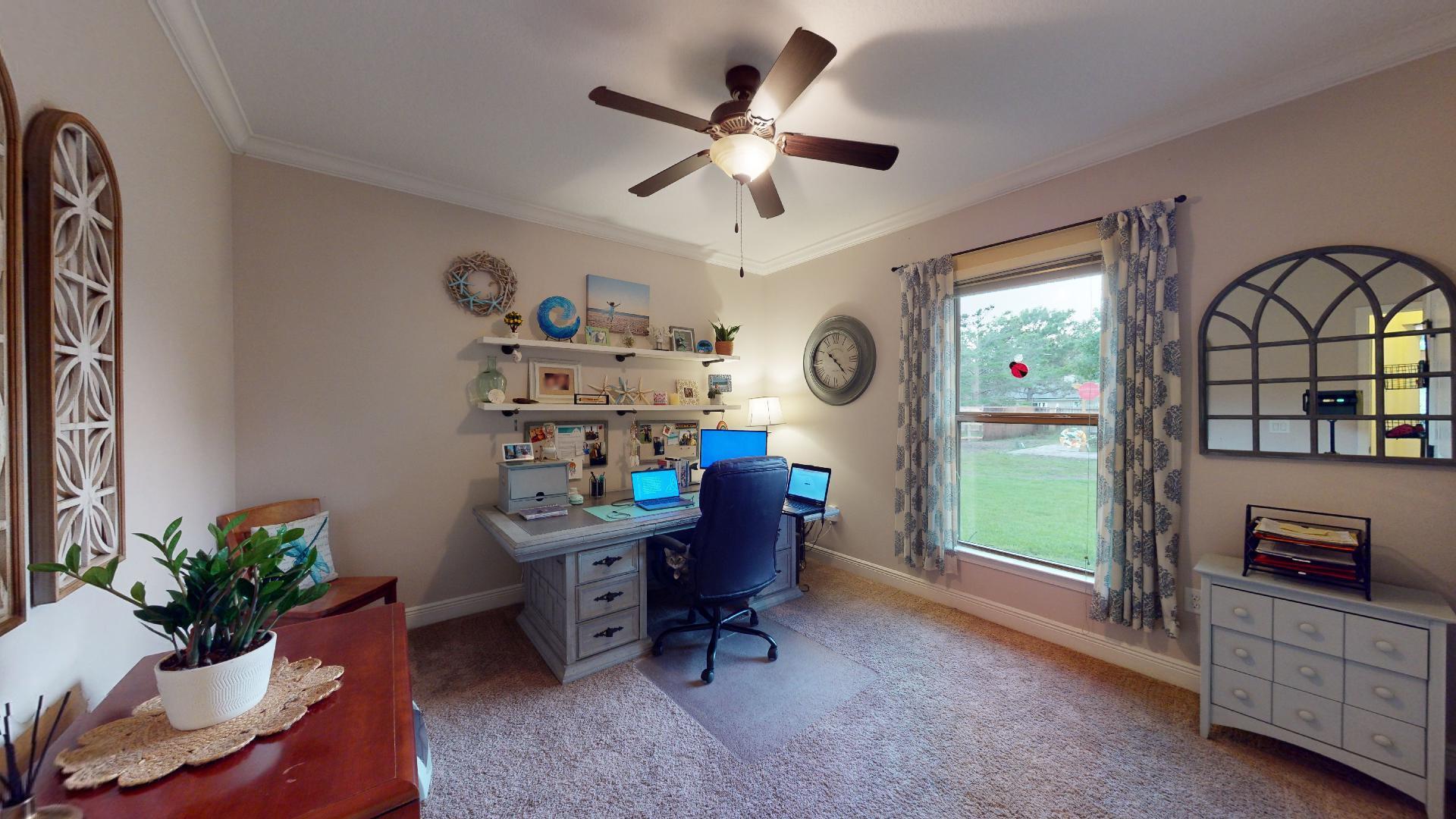 1959 Commodore Drive Navarre, FL 32566 - Photo 39 of 56 a workspace with furniture and window