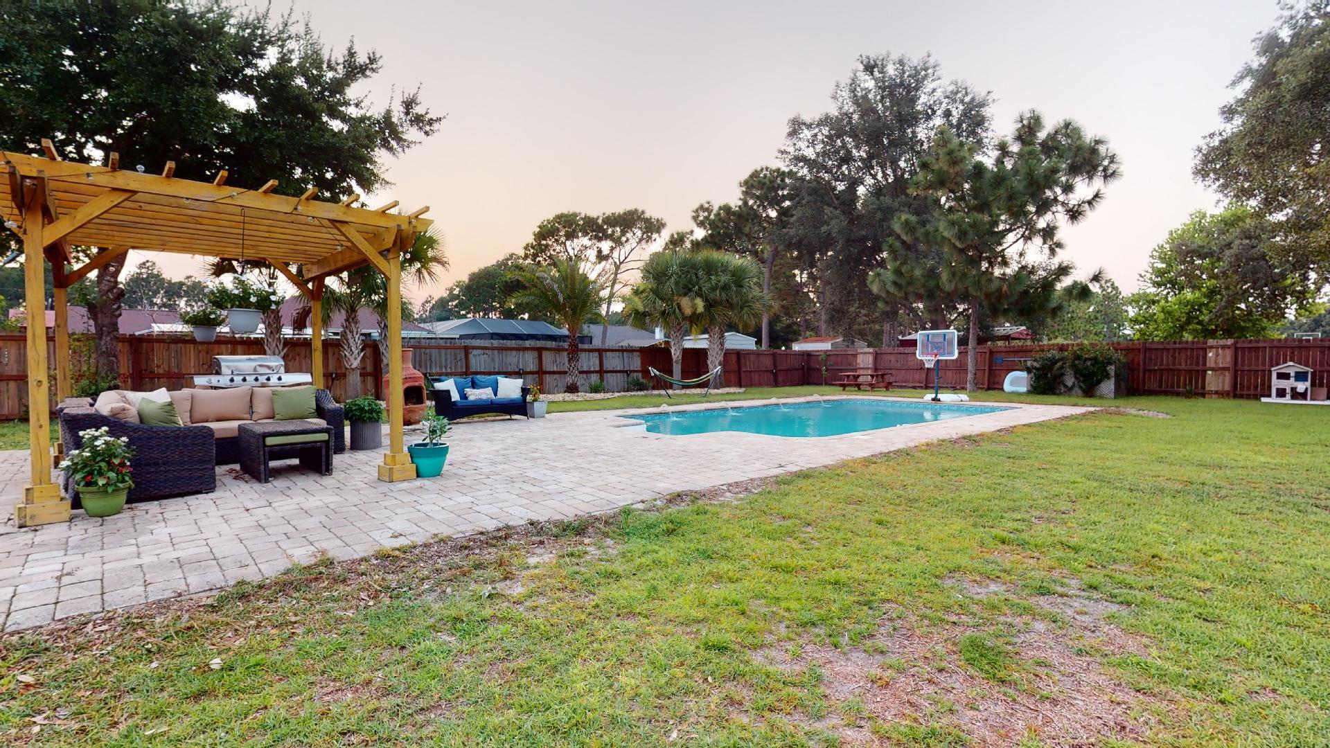 1959 Commodore Drive Navarre, FL 32566 - Photo 51 of 56 a childrens park with lots of swings and slides