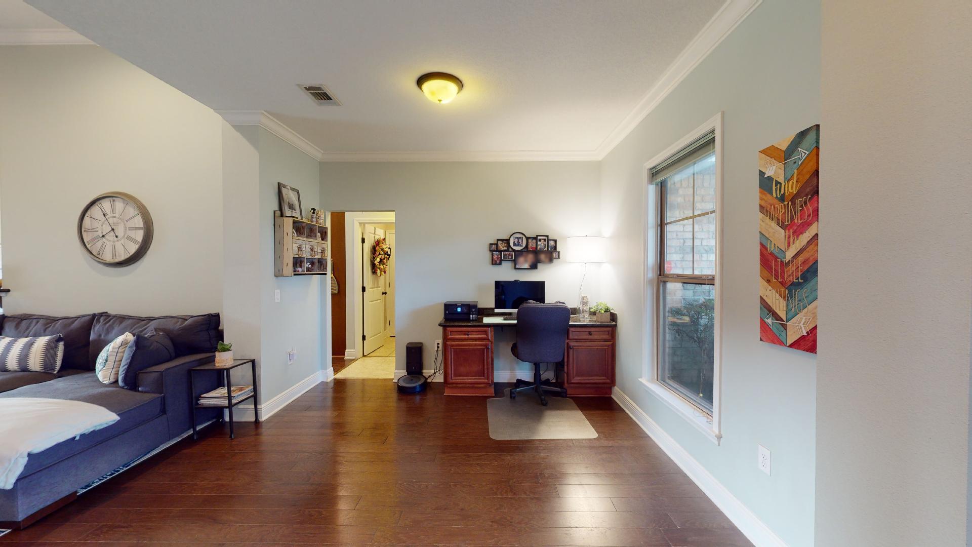 1959 Commodore Drive Navarre, FL 32566 - Photo 9 of 56 a living room with furniture and wooden floor