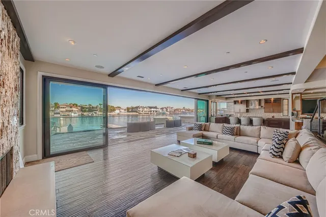 a bedroom with a large bed and a balcony