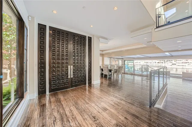 a spacious bedroom with a bed and a couch