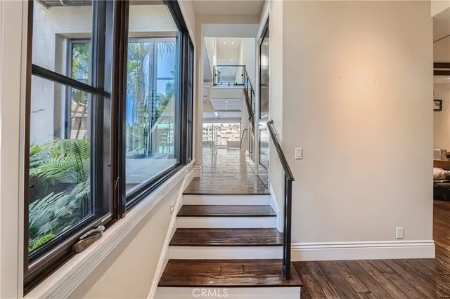 a kitchen with stainless steel appliances granite countertop a stove and a refrigerator