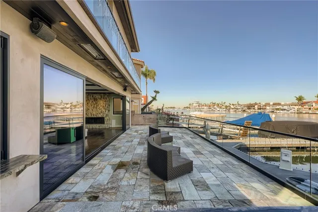 a large kitchen with stainless steel appliances kitchen island granite countertop a large counter top space and stainless steel appliances