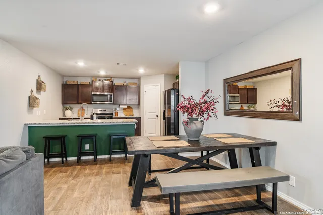 a view of a dining room with furniture