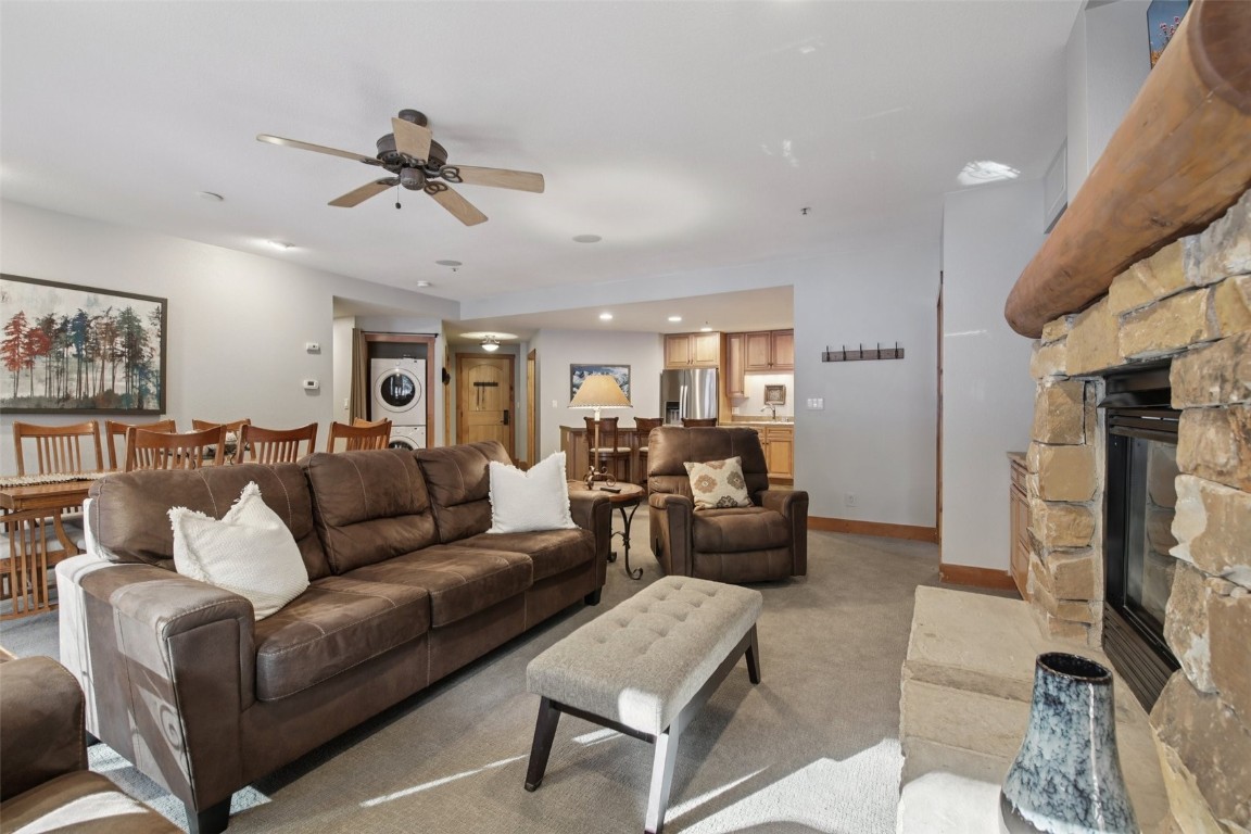 224 Trailhead Drive, Unit 3074 Keystone, CO 80435 - Photo 14 of 49 a living room with furniture and a flat screen tv