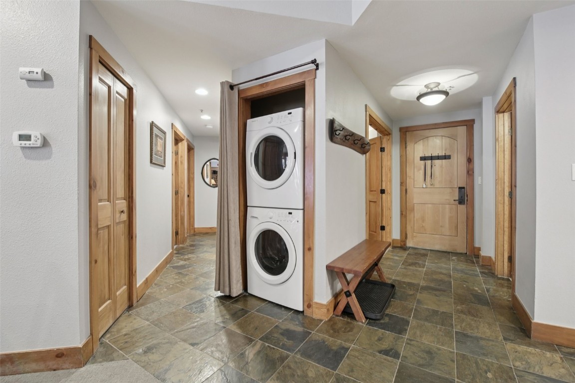 224 Trailhead Drive, Unit 3074 Keystone, CO 80435 - Photo 23 of 49 a view of a hallway with washer and dryer