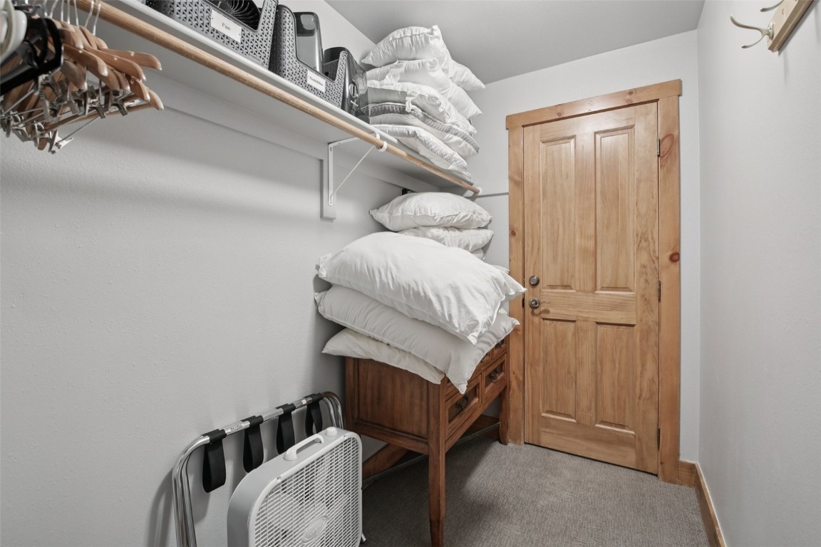 224 Trailhead Drive, Unit 3074 Keystone, CO 80435 - Photo 28 of 49 a bedroom with a bed and a window