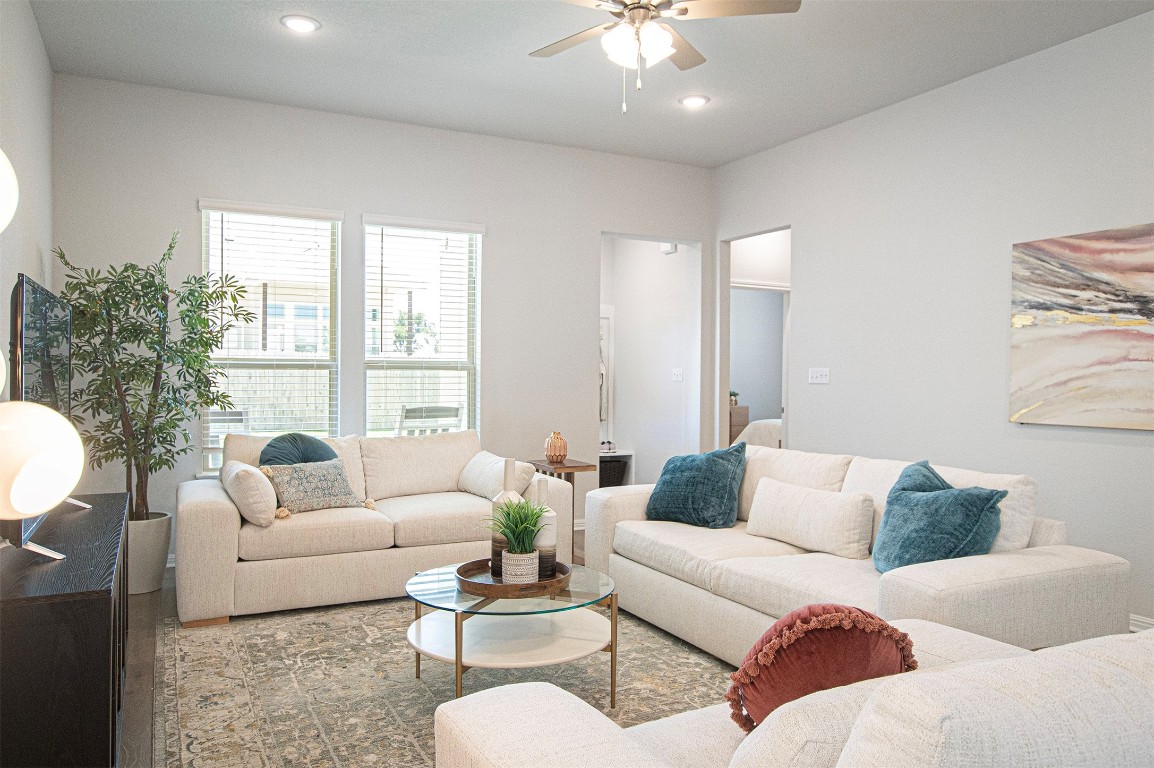 249 Treadwell Lane Kyle, TX 78640 - Photo 14 of 32 a living room with furniture and a large window