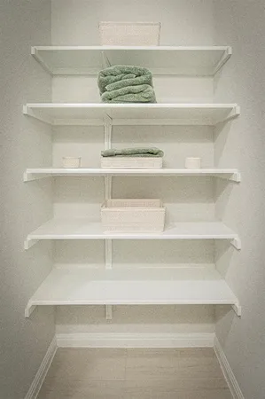 a view of a closet with shelf