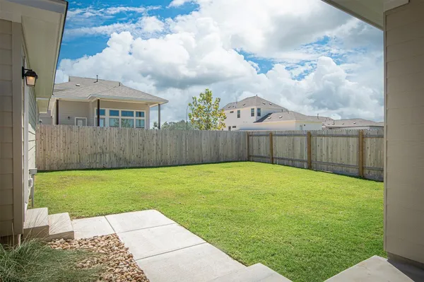 a view of a backyard with a garden