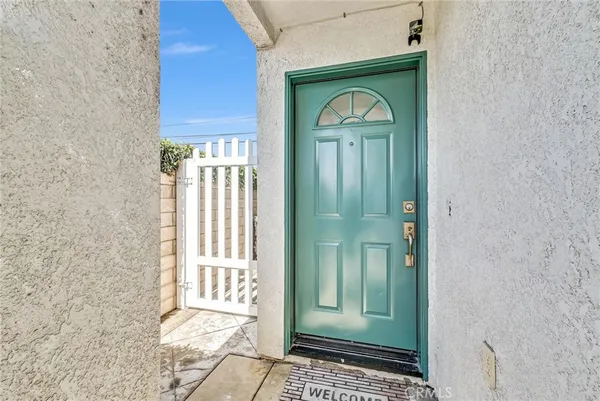 a front view of a house with a glass door