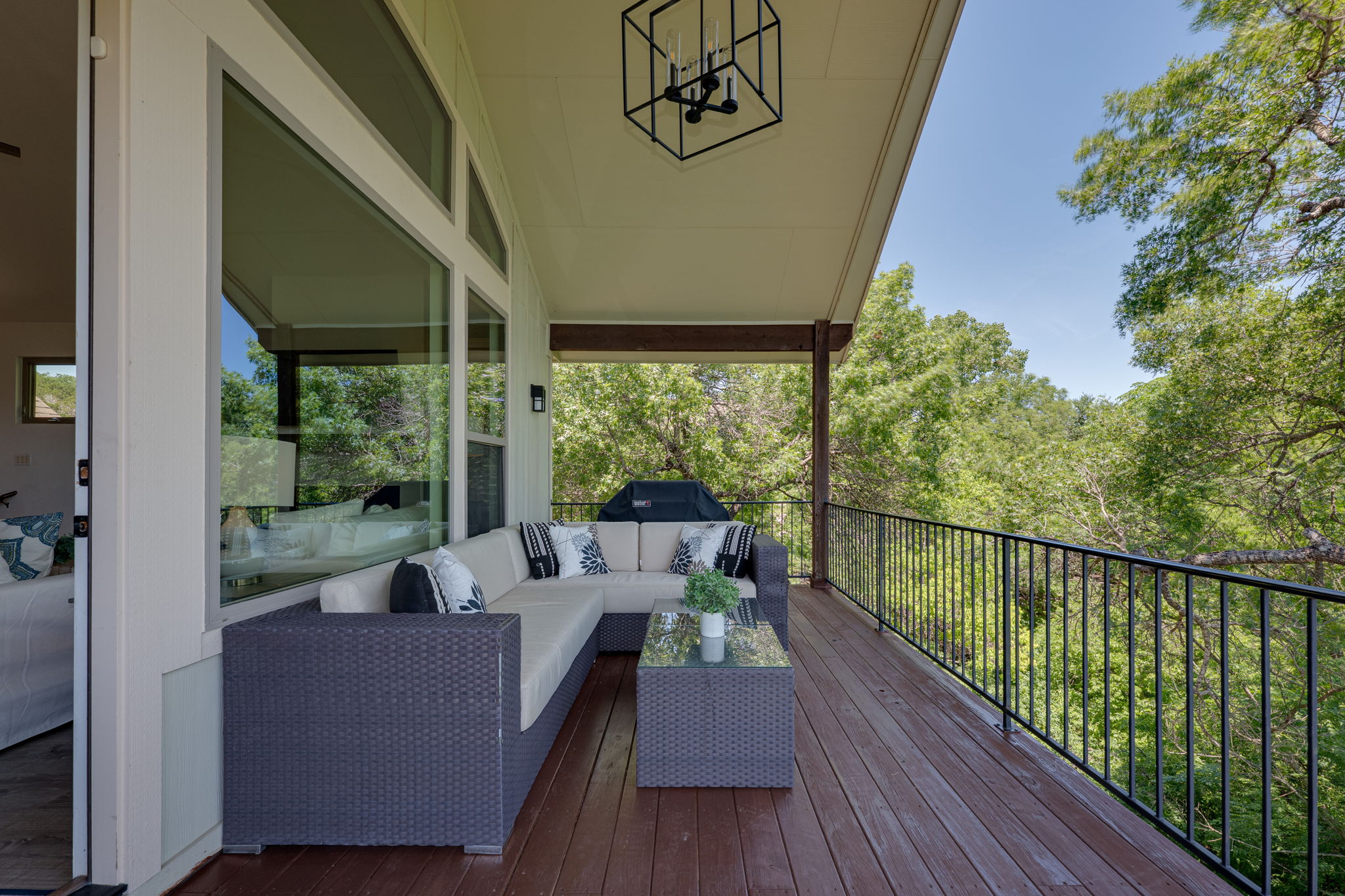 433 Venture Boulevard South Point Venture, TX 78645 - Photo 2 of 36 Perched among the trees in the heart of Point Venture, this home feels like a private treehouse hideaway, where lake life, majestic greenbelt views, and that front-row-seat-to-the-good-life feeling all come together.