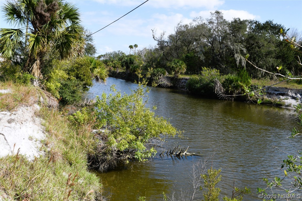 4366 Whiting Way Edgewater, FL 32141 - Photo 4 of 11 an aerial view of a houses with a lake view