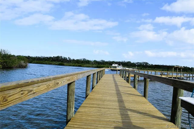 a view of wooden floor with a lake