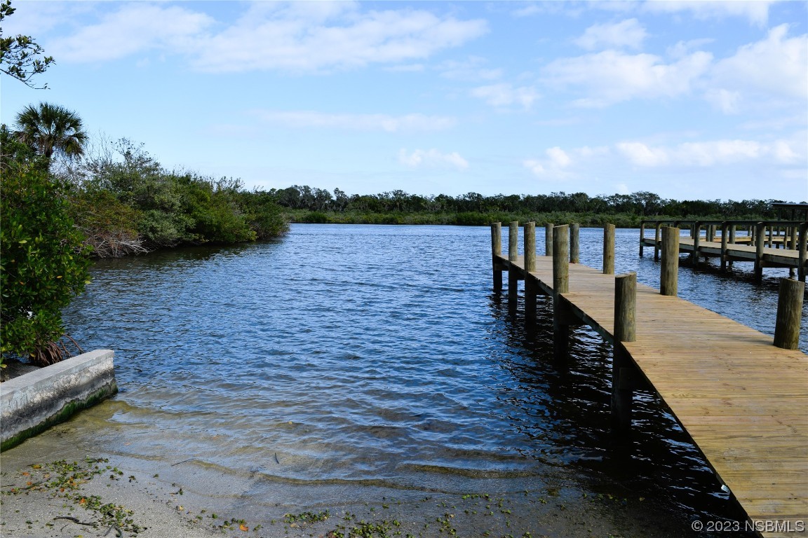 4366 Whiting Way Edgewater, FL 32141 - Photo 8 of 11 a view of a lake