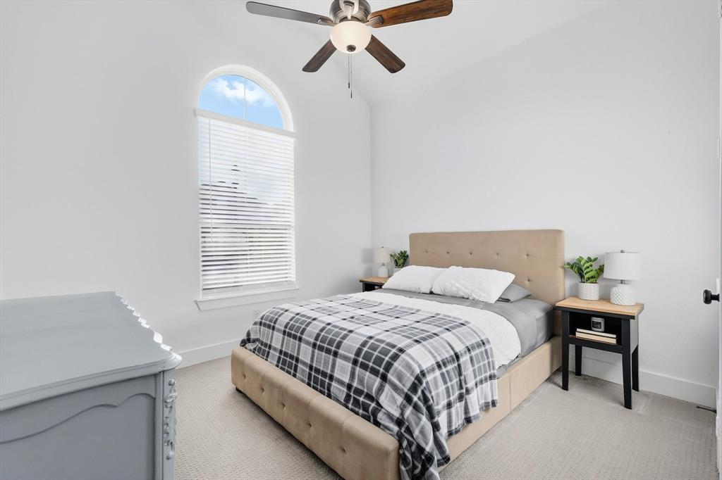 4608 Mount Vista Road Oak Point, TX 75068 - Photo 31 of 39 Vaulted ceilings complemented by a modern ceiling fan with light fixture