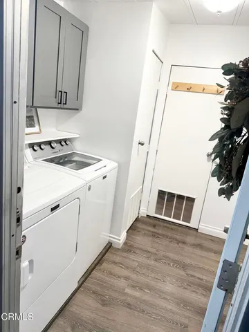 a view of entryway with wooden floor